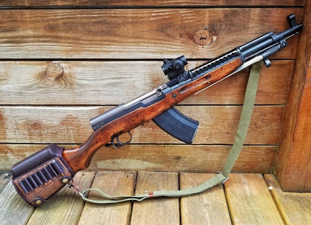 SKS carbine with wooden stock and scope, ideal for training and hunting activities