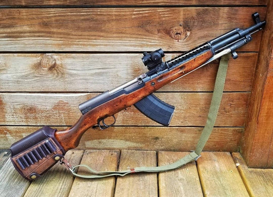 SKS carbine with wooden stock and scope, ideal for training and hunting activities