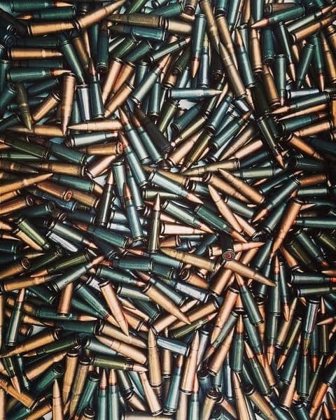 Best magazine loaders for shooting with a variety of rifle cartridges scattered on a surface
