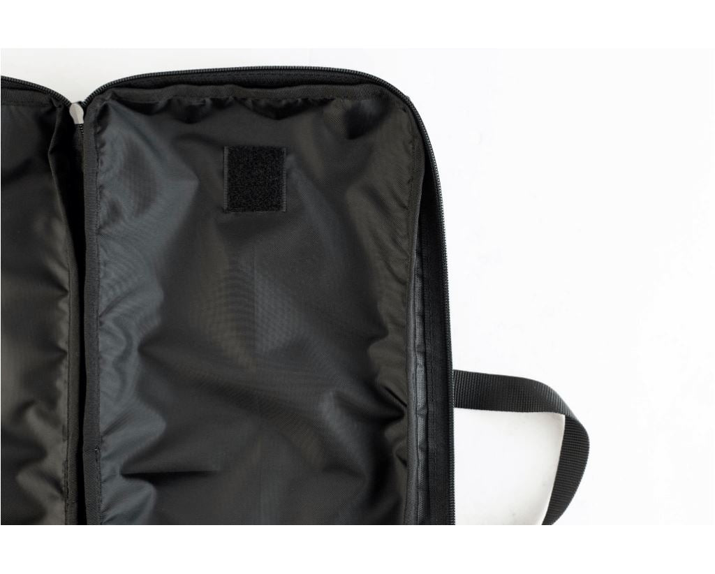 Interior view of the Podavach bench loader carrying case with padded compartments for protection