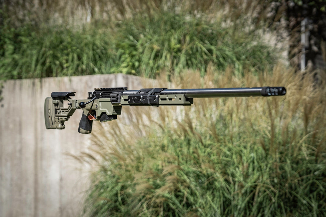 A rifle with a scope attached to it